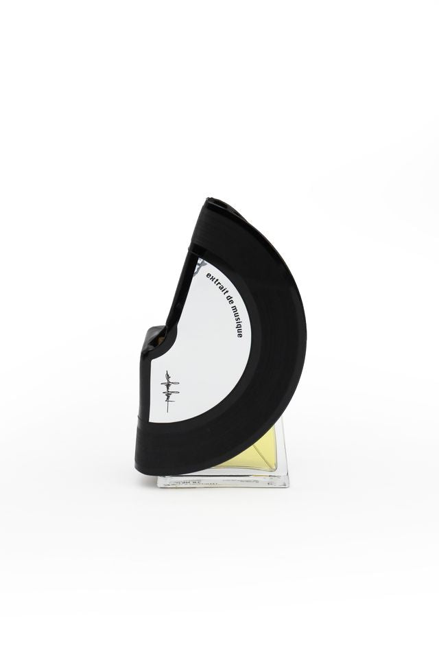 'Filippo Sorcinelli Organ Series'Black and white perfume bottle with cap on a white background