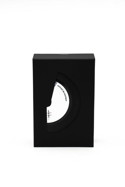 'Filippo Sorcinelli Organ #5'A black rectangular display box with a circular cutout, showing a white circular insert with black text, photographed on a clean white background.