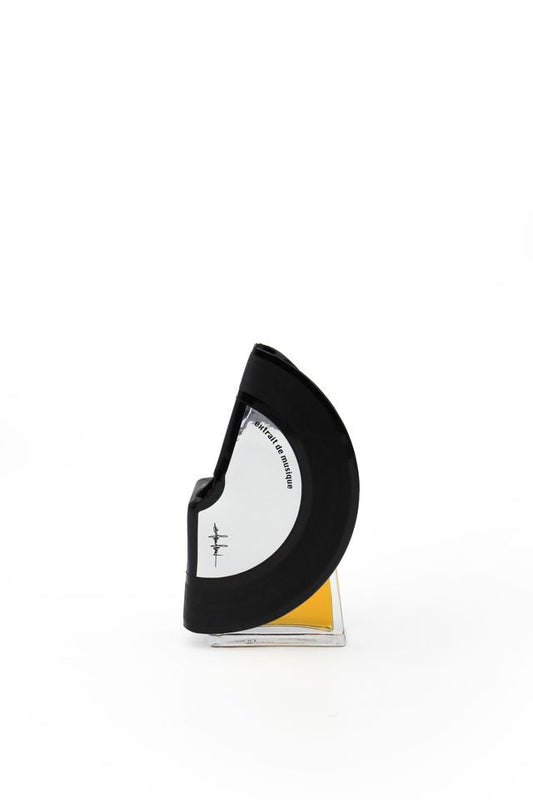 'Filippo Sorcinelli Organ #6'Black and white perfume bottle with cap on a white background