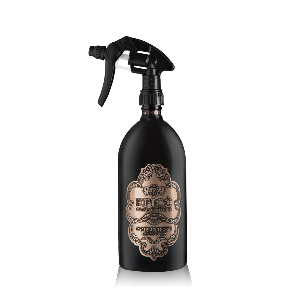 A black spray bottle with a gold EPICO label, Pamplemousse - Ambiance Spray by EPICO features vintage-style details and an aromatic, elegant grapefruit-inspired fragrance. Comes with a trigger spray nozzle for easy use.