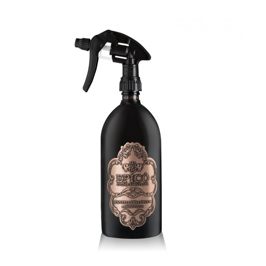 A black Pantelleria Fycus Ambiance Spray by EPICO, featuring a gold label with ornate detailing, is shown against a white background. Its vintage-inspired design evokes luxurious scents of amber woods, cassis, and fig.