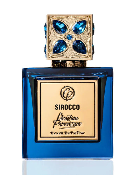 Sirocco Extrait De Parfum by Christian Provenzano Blue perfume bottle perfume bottle with gold cap and label on a white background