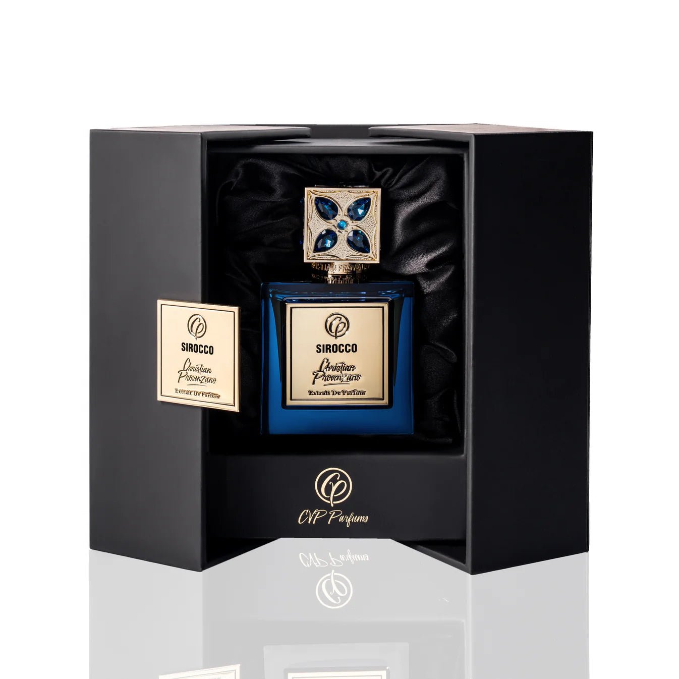 Sirocco Extrait De Parfum by Christian Provenzano Blue perfume bottle perfume bottle with gold cap and label on a white background in its black packaging