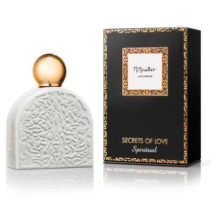 A white SPIRITUAL Eau de Parfum bottle from M.Micallef with a gold round cap stands next to its black and gold box. The embossed design suggests the floral allure within this M.Micallef fragrance.