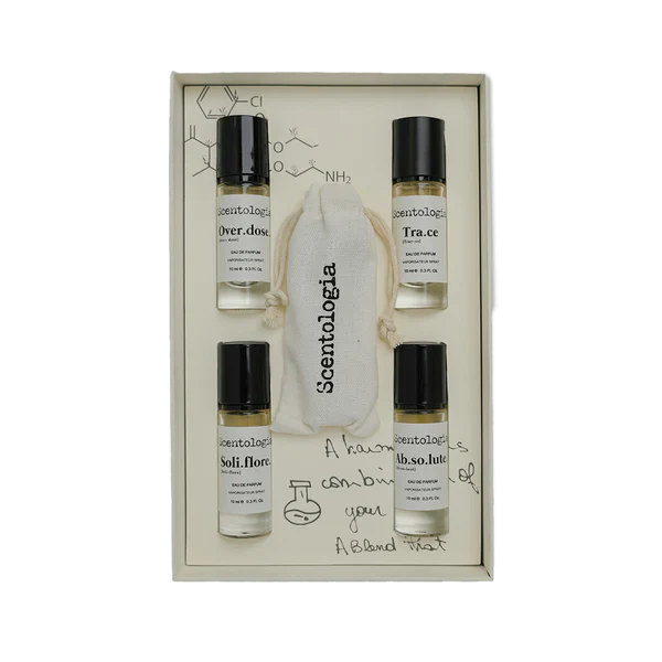 The Scentologia Travel Kit 5x10ML includes five travel-size perfumes and a signature cloth bag—ideal for fragrance lovers on the move. Presented in a sleek, white display.