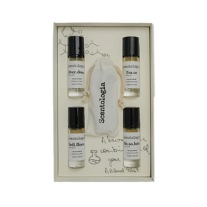 The Scentologia Travel Kit 5x10ML includes five travel-size perfumes and a signature cloth bag—ideal for fragrance lovers on the move. Presented in a sleek, white display.