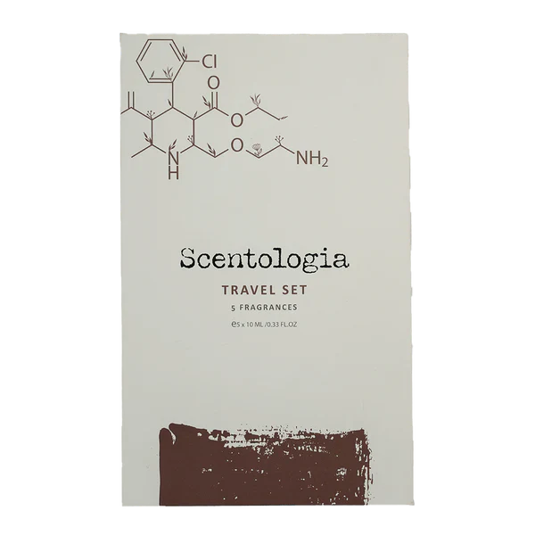 The cream-colored Scentologia Travel Kit 5x10ML box showcases a chemical structure design, bold black text, and a brown brushstroke—ideal for luxury travel fragrance enthusiasts.